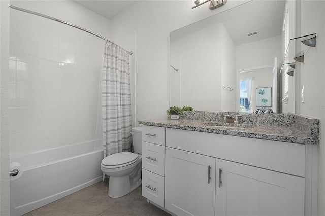 16484 Angel Fish Rd, Winter Garden, FL 34787 - full bath with toilet, tile patterned flooring, shower / bath combo with shower curtain, and vanity