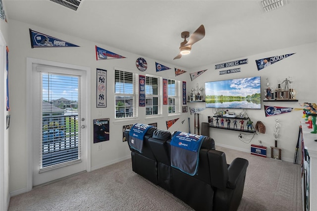 16484 Angel Fish Rd, Winter Garden, FL 34787 - carpeted living room featuring a ceiling fan and baseboards