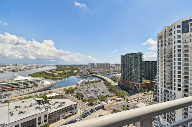 water view featuring nearby urban area and a notable bridge