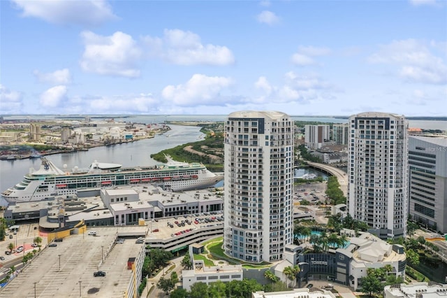 view of urban area with a large body of water