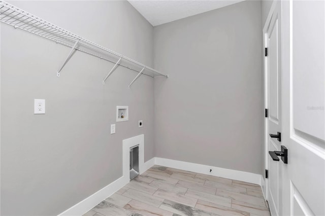 12197 SW 76th Ln, Dunnellon, FL 34432 - laundry area featuring washer hookup, hookup for an electric dryer, and baseboards