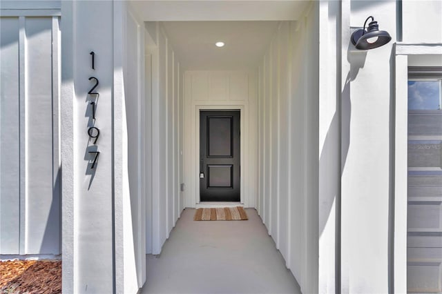 12197 SW 76th Ln, Dunnellon, FL 34432 - property entrance featuring elevator and board and batten siding