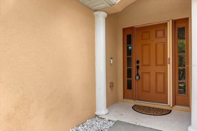 14617 Keelford Way, Orlando, FL 32824 - doorway to property with stucco siding