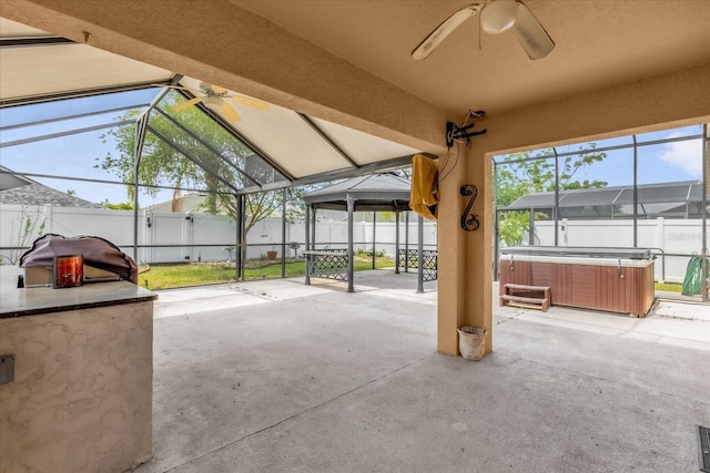 14617 Keelford Way, Orlando, FL 32824 - unfurnished sunroom featuring a hot tub, ceiling fan, and vaulted ceiling