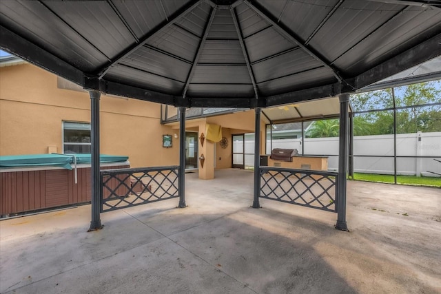 14617 Keelford Way, Orlando, FL 32824 - view of patio with a hot tub, fence, and area for grilling