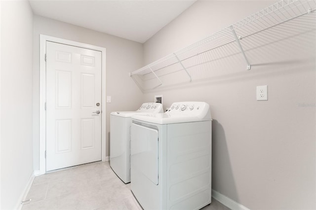 3971 Guernsey Bnd, Saint Cloud, FL 34772 - laundry area with independent washer and dryer and baseboards
