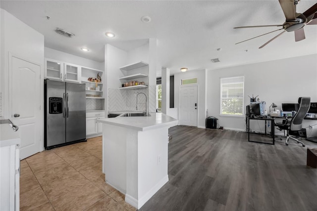2330 Little Gem Loop, Sanford, FL 32773 - kitchen featuring stainless steel fridge, open floor plan, a ceiling fan, open shelves, and white cabinetry