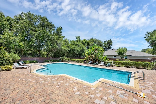2330 Little Gem Loop, Sanford, FL 32773 - community pool featuring a patio area