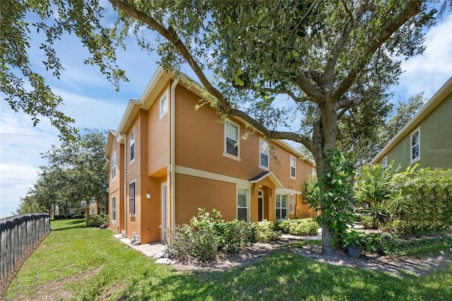 2330 Little Gem Loop, Sanford, FL 32773 - view of home's exterior featuring stucco siding