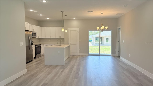 475 Marion Oaks Mnr, Ocala, FL 34473 - kitchen with appliances with stainless steel finishes, a sink, light wood-style floors, baseboards, and recessed lighting
