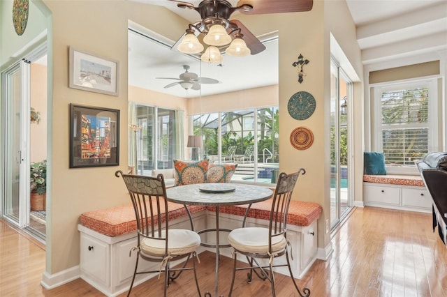 13524 Glynshel Dr, Winter Garden, FL 34787 - dining room featuring ceiling fan, light wood finished floors, and baseboards