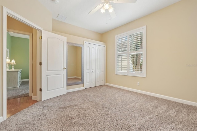 13524 Glynshel Dr, Winter Garden, FL 34787 - unfurnished bedroom with carpet flooring, baseboards, a closet, and a ceiling fan