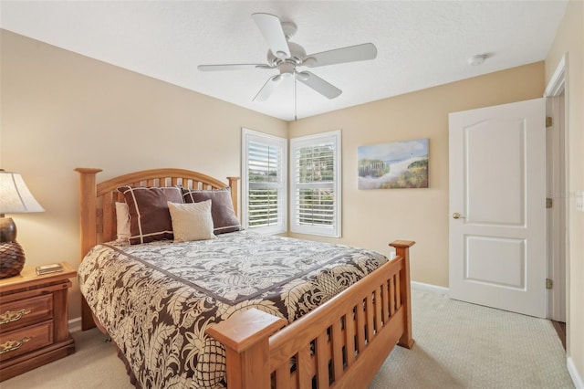 13524 Glynshel Dr, Winter Garden, FL 34787 - bedroom with light colored carpet, baseboards, and ceiling fan