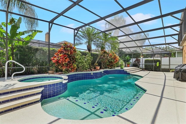 13524 Glynshel Dr, Winter Garden, FL 34787 - view of swimming pool featuring a patio area, glass enclosure, a pool with connected hot tub, and fence