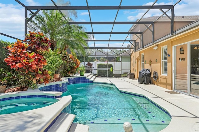 13524 Glynshel Dr, Winter Garden, FL 34787 - view of swimming pool with a lanai, a patio area, and a pool with connected hot tub