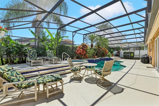 13524 Glynshel Dr, Winter Garden, FL 34787 - view of patio featuring glass enclosure, a pool with connected hot tub, and fence