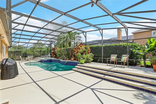 13524 Glynshel Dr, Winter Garden, FL 34787 - view of swimming pool featuring a patio area, a pool with connected hot tub, a lanai, and area for grilling
