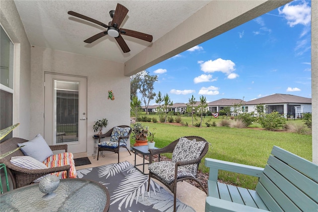 8413 SW 54th Loop, Ocala, FL 34481 - view of patio featuring ceiling fan and a residential view