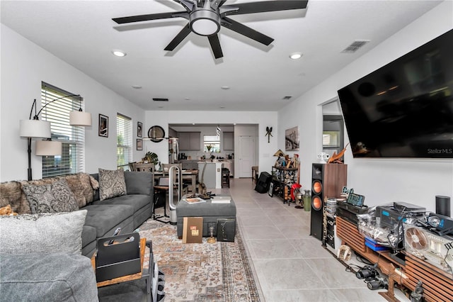 8413 SW 54th Loop, Ocala, FL 34481 - living room featuring ceiling fan, light tile patterned floors, and recessed lighting