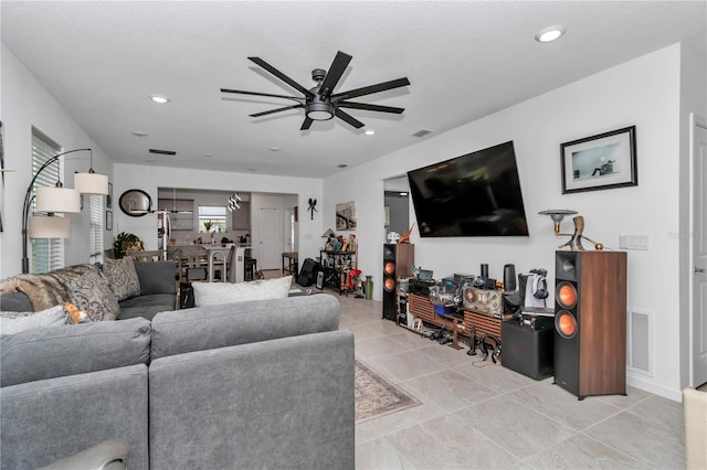 8413 SW 54th Loop, Ocala, FL 34481 - living area with a ceiling fan, recessed lighting, and light tile patterned flooring