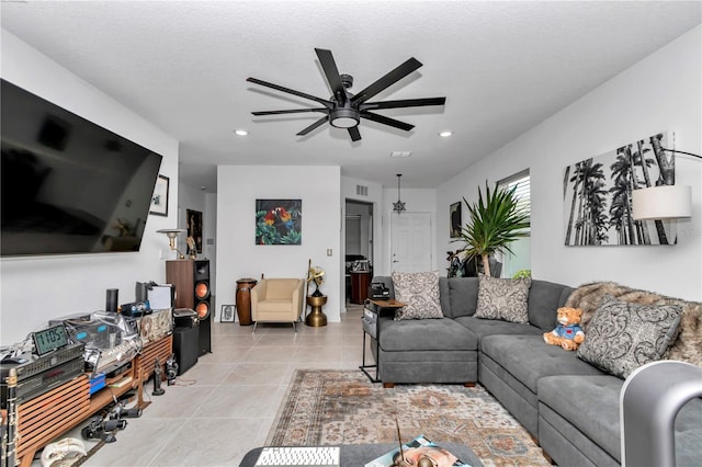 8413 SW 54th Loop, Ocala, FL 34481 - living room with a ceiling fan, recessed lighting, and light tile patterned flooring