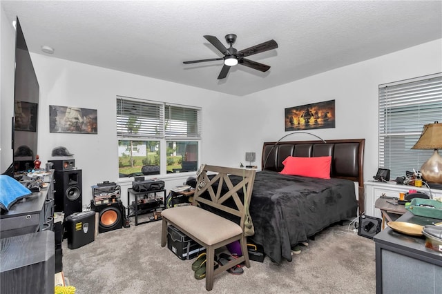 8413 SW 54th Loop, Ocala, FL 34481 - carpeted bedroom with ceiling fan and a textured ceiling