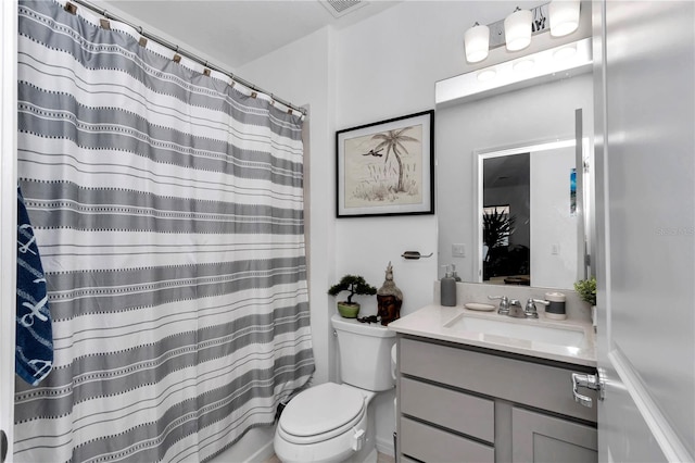 8413 SW 54th Loop, Ocala, FL 34481 - full bathroom with vanity, toilet, and curtained shower