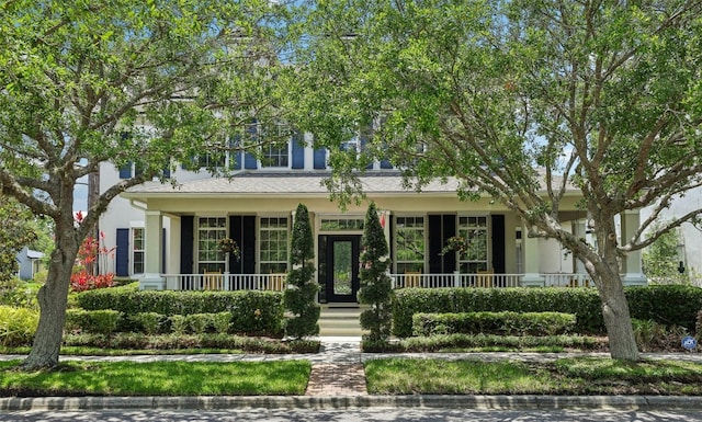 view of front of house featuring covered porch