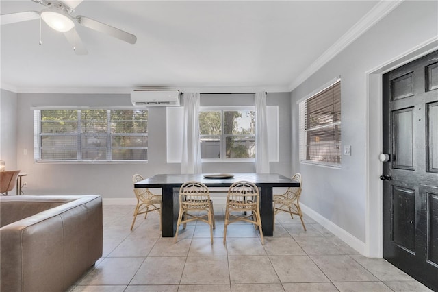 dining area featuring a wall unit AC, baseboards, crown molding, a ceiling fan, and light tile patterned floors