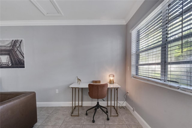 office area with tile patterned flooring, crown molding, and baseboards