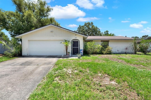 single story home with driveway, an attached garage, and a front lawn