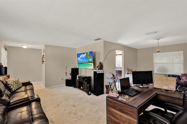 living area featuring light carpet, an office area, a textured ceiling, and baseboards