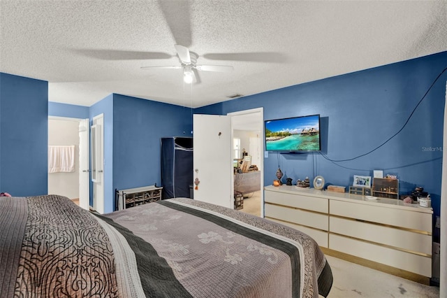 bedroom featuring a textured ceiling and ceiling fan