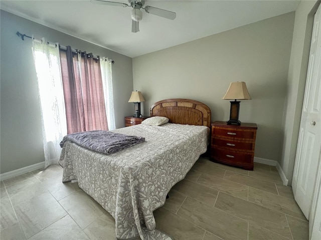 2376 Flamingo Lakes Dr, Kissimmee, FL 34743 - bedroom featuring baseboards and a ceiling fan