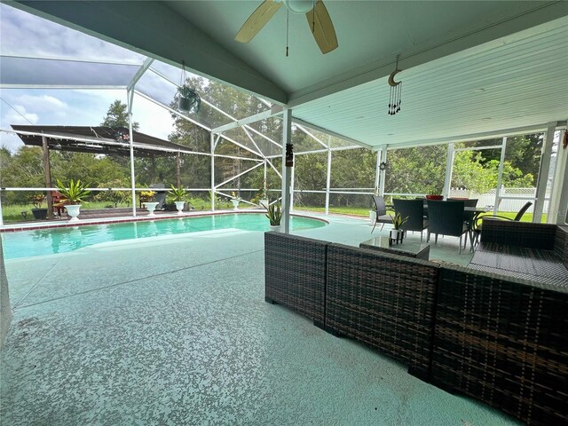 2376 Flamingo Lakes Dr, Kissimmee, FL 34743 - outdoor pool featuring a ceiling fan, a patio, and a lanai