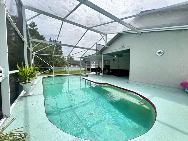 2376 Flamingo Lakes Dr, Kissimmee, FL 34743 - outdoor pool with a patio and a lanai