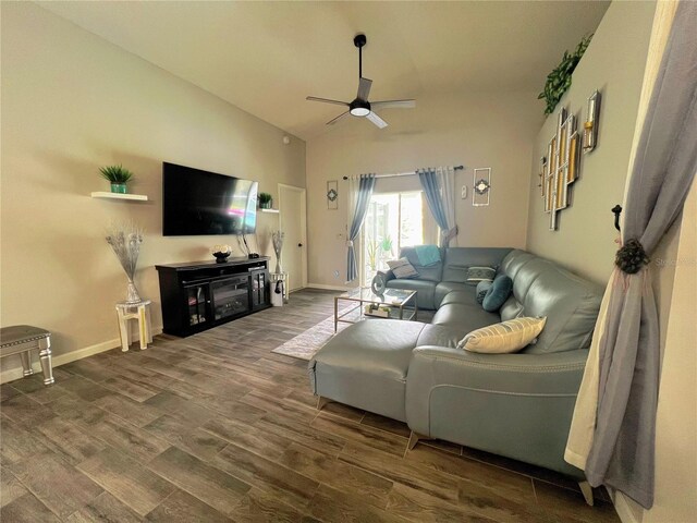 2376 Flamingo Lakes Dr, Kissimmee, FL 34743 - living area with ceiling fan, wood finished floors, lofted ceiling, and baseboards
