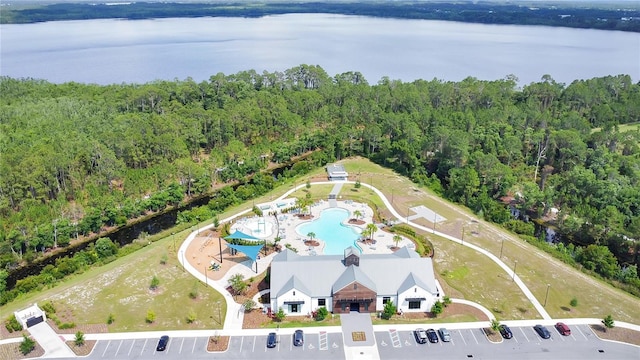 2834 Common Crane Ct, Saint Cloud, FL 34773 - bird's eye view of a pool area, a large body of water, and a heavily wooded area