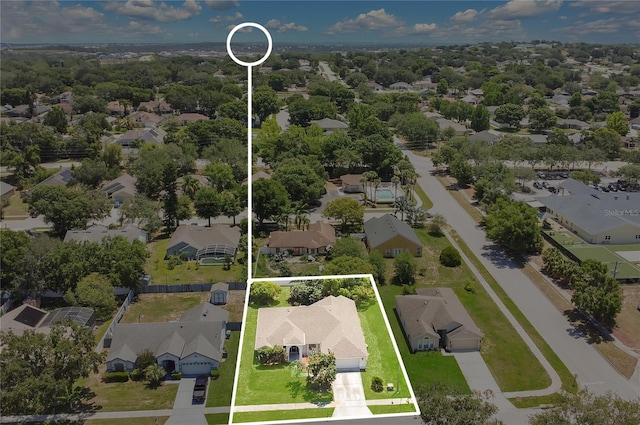 922 Hatteras Ave, Minneola, FL 34715 - aerial perspective of suburban area featuring property boundaries highlighted