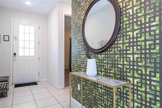 9038 Sunshine Ridge Loop, Kissimmee, FL 34747 - foyer entrance with tile patterned flooring and baseboards