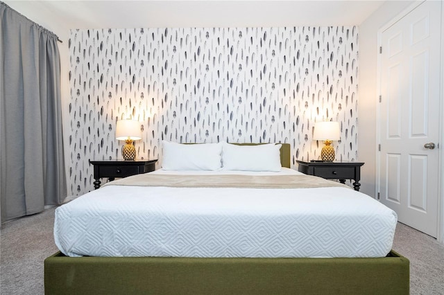 9038 Sunshine Ridge Loop, Kissimmee, FL 34747 - carpeted bedroom featuring wallpapered walls and an accent wall