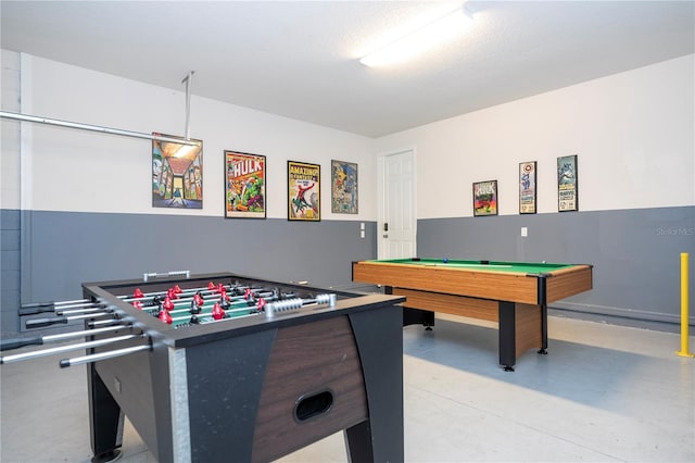 9038 Sunshine Ridge Loop, Kissimmee, FL 34747 - playroom featuring billiards table and finished concrete flooring
