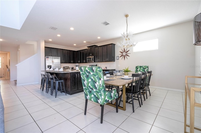 9038 Sunshine Ridge Loop, Kissimmee, FL 34747 - dining area with recessed lighting, a chandelier, light tile patterned floors, and baseboards