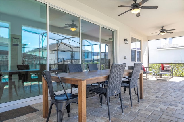 9038 Sunshine Ridge Loop, Kissimmee, FL 34747 - view of patio / terrace featuring ceiling fan and outdoor dining area
