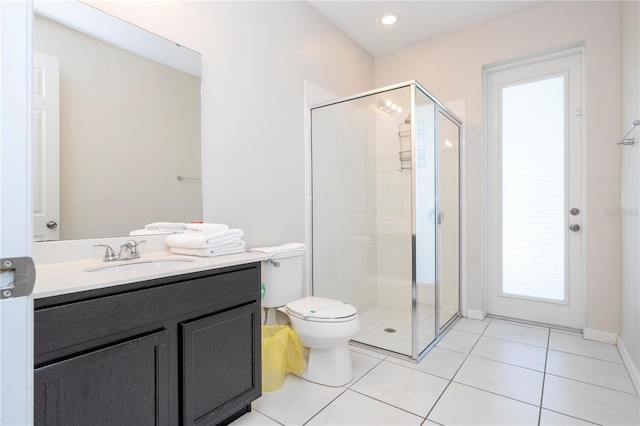 9038 Sunshine Ridge Loop, Kissimmee, FL 34747 - full bathroom with a shower stall, vanity, toilet, tile patterned flooring, and recessed lighting