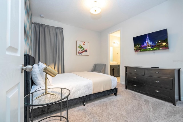 9038 Sunshine Ridge Loop, Kissimmee, FL 34747 - bedroom with light colored carpet and ensuite bath