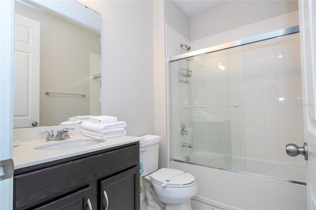9038 Sunshine Ridge Loop, Kissimmee, FL 34747 - bathroom featuring vanity, toilet, and enclosed tub / shower combo