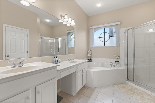 14174 Islamorada Dr, Orlando, FL 32837 - bathroom featuring a shower stall, tile patterned floors, a garden tub, and double vanity