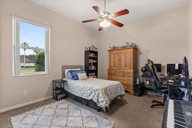 14174 Islamorada Dr, Orlando, FL 32837 - bedroom featuring carpet flooring, an office area, baseboards, and a ceiling fan