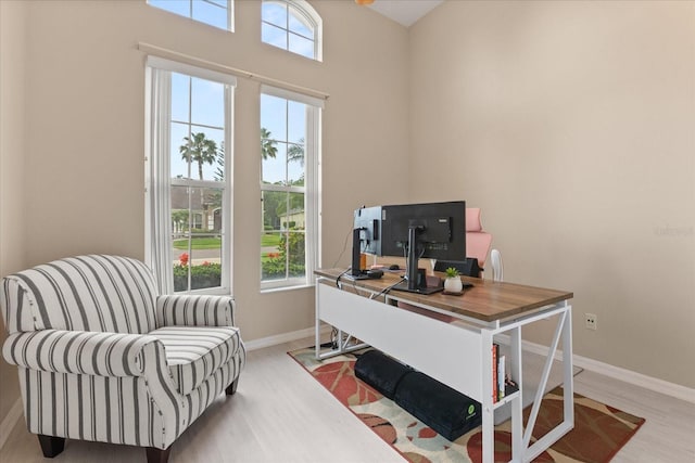 14174 Islamorada Dr, Orlando, FL 32837 - office area with baseboards and light wood-style floors